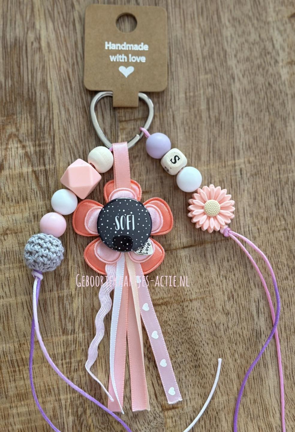 Gewonnen naamsleutelhangers zijn onderweg!