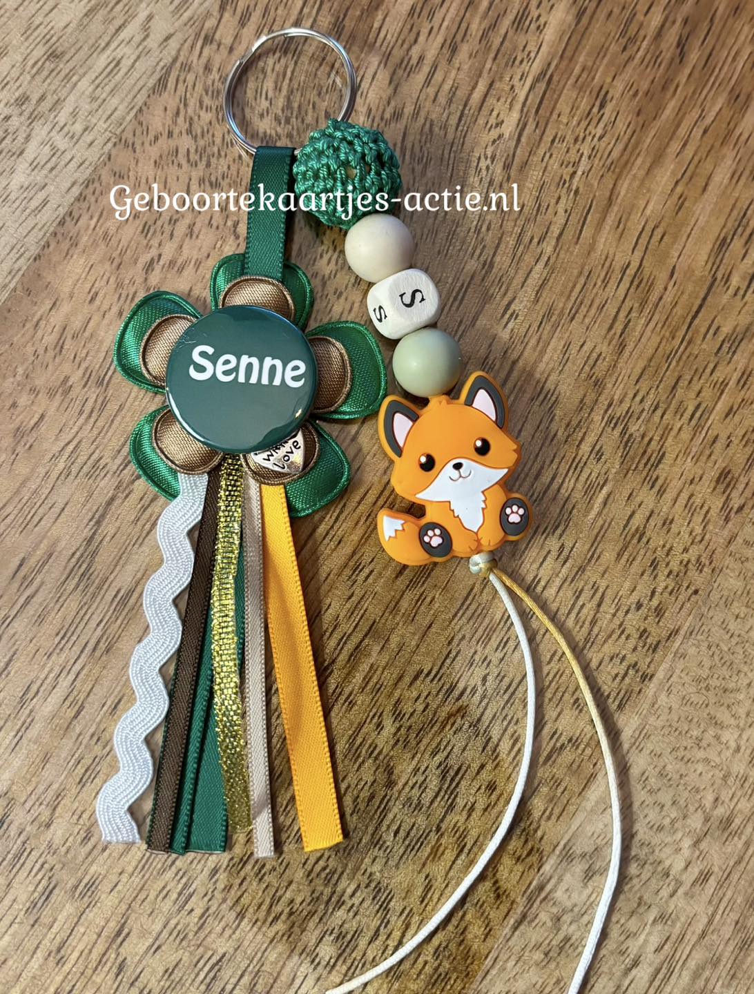 De volgende 14 naamsleutelhangers