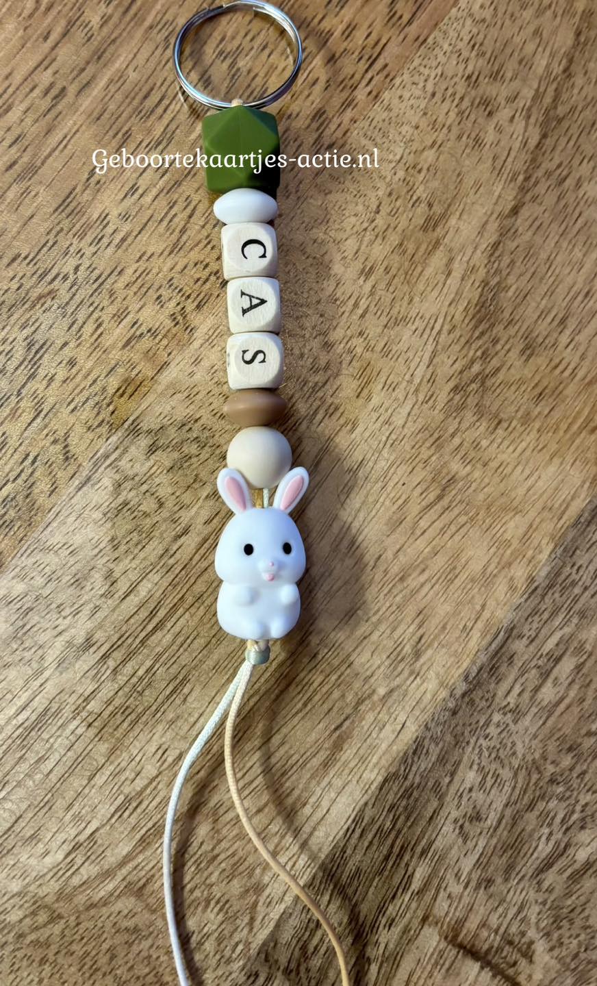 De volgende 14 naamsleutelhangers